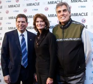 Verne Martell, his wife Lisa, and Mark Begich